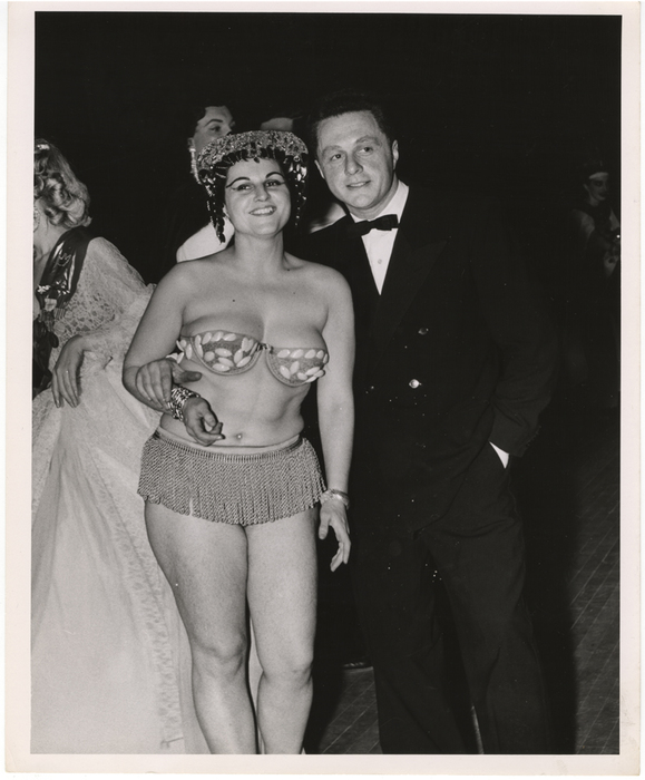 [costumed woman and a man at a ball]