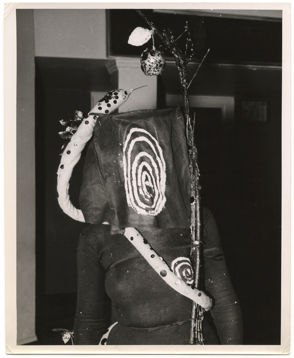 [woman wearing garden of eden costume]