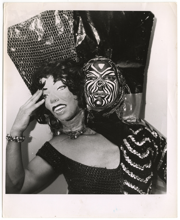 [man wearing two headed costume]