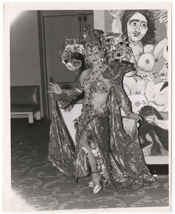 [Man wearing costume]