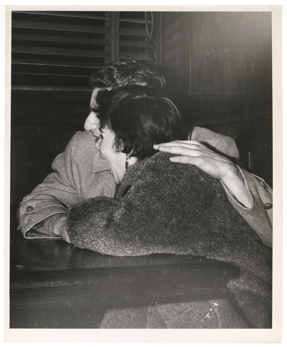 [woman and man laughing]