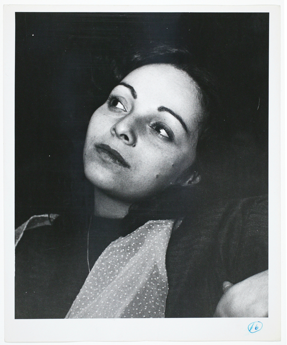 [Woman in a Grenwich Village cafe]