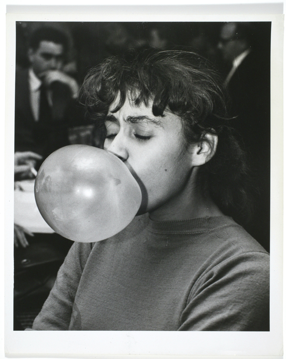 [Woman blowing a bubble]