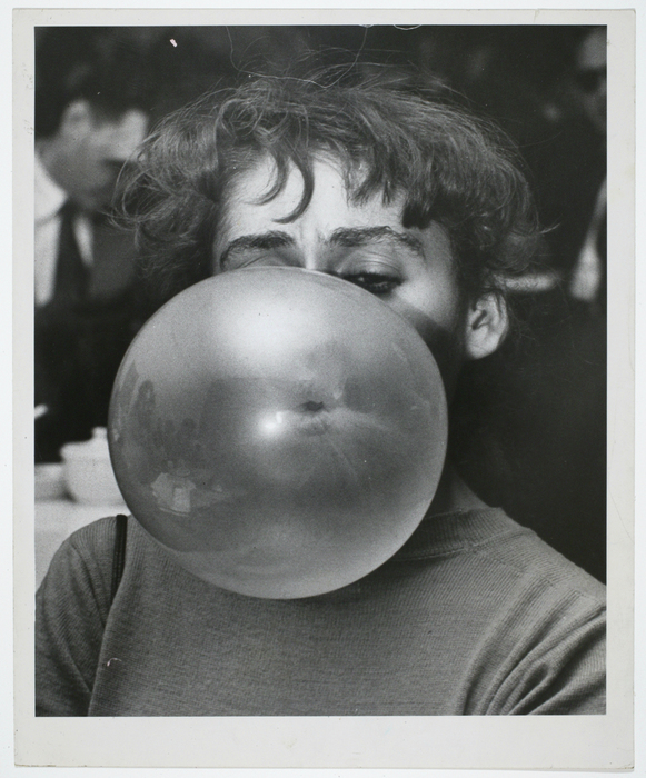 [Woman blowing a bubble]