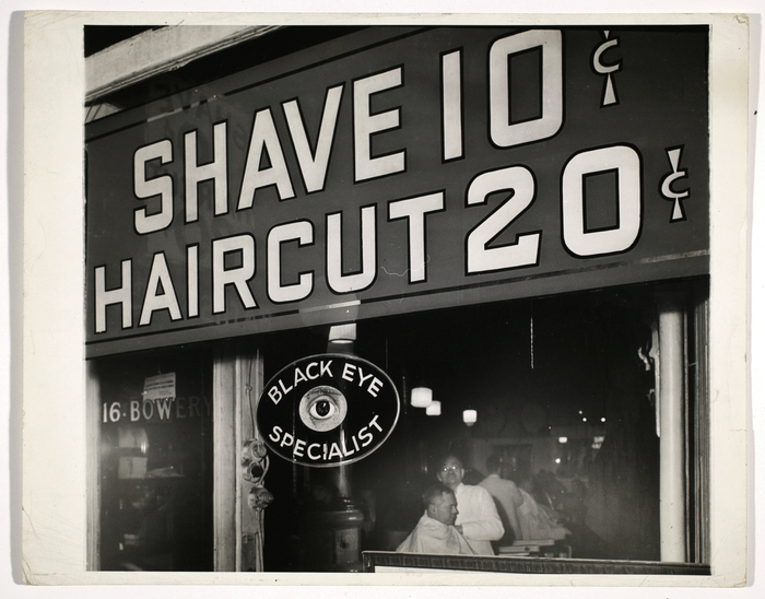 [Shave 10¢, Haircut 20¢, Black Eye Specialist]