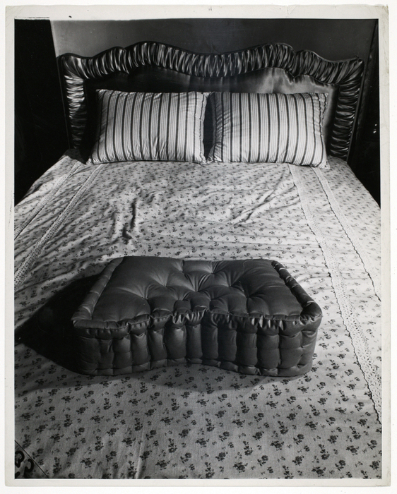 [Bundling bed and pillows]