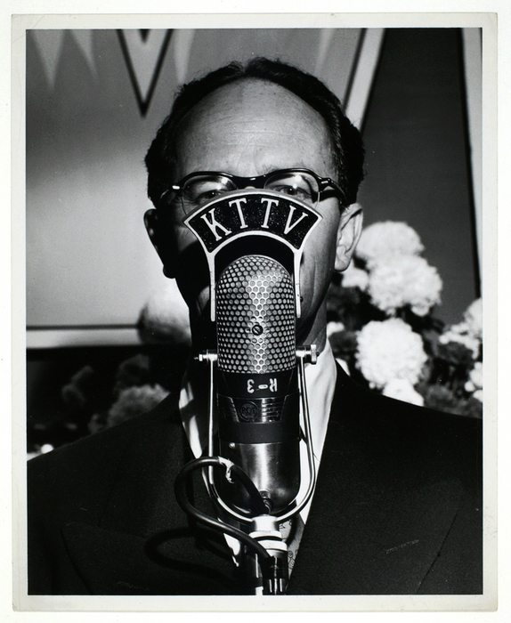 [Man and KTTV microphone]