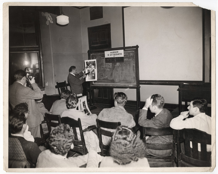 [Weegee delivering lecture called "Murder is My Business"]