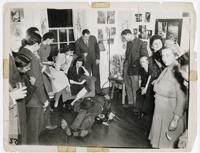 [Weegee playing dead for audience at "Murder by Weegee," The Gamut Arts Club, New York]