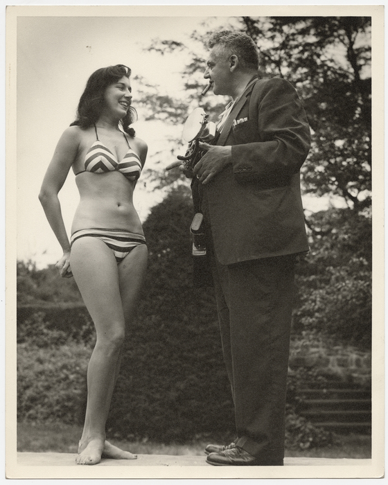 [Weegee and woman in bikini]