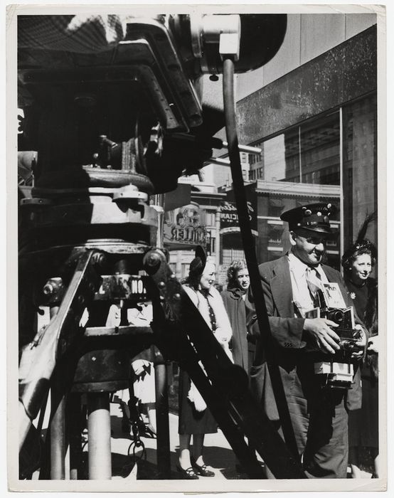 [Weegee as a street photographer on the set of "Every Girl Should Be Married"]