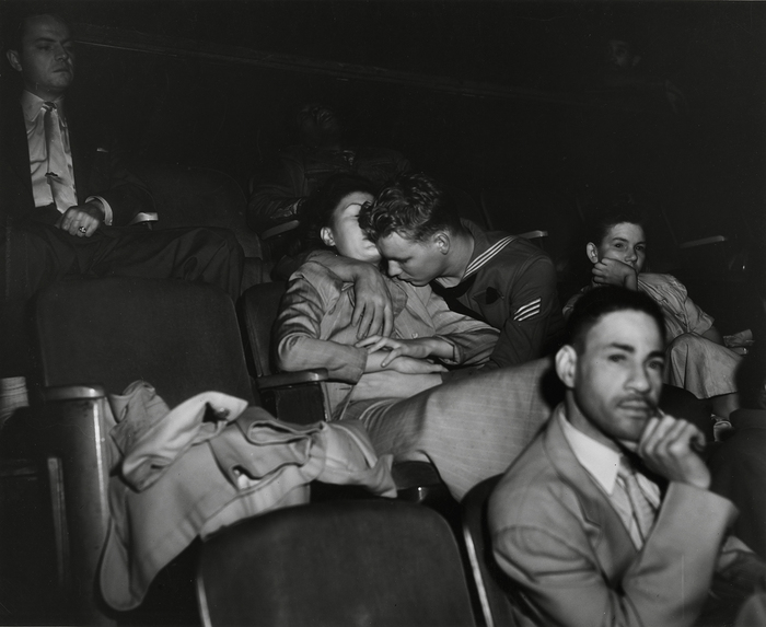 Sailor and girl at the movie