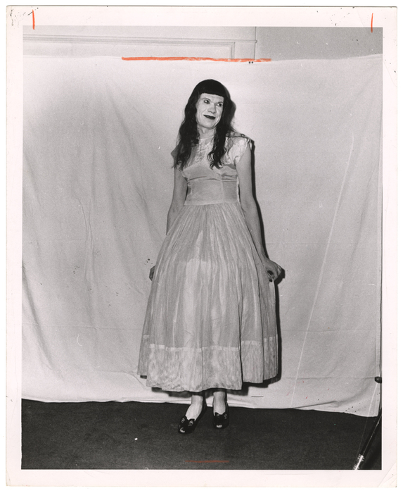 [cross dressing man posing]