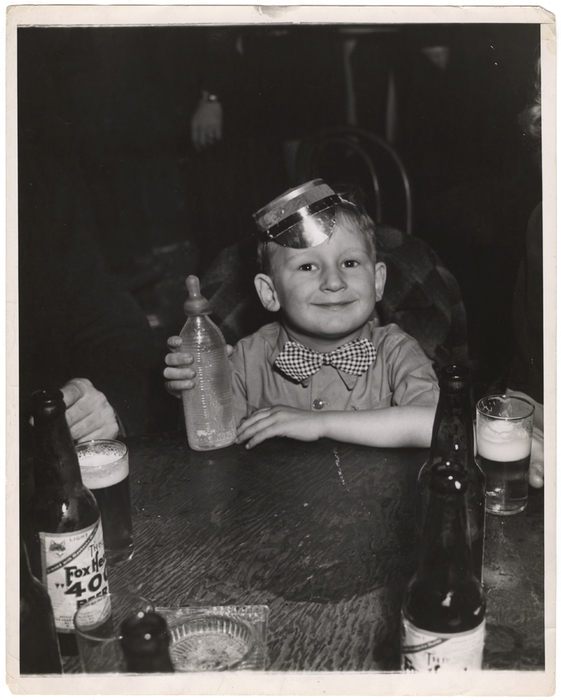 "New Year's at 5 in the morning in a night club, I found this 3 year old with his parents welcoming the New Year with milk"
