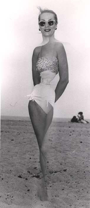 Blonde on beach, with sunglasses
