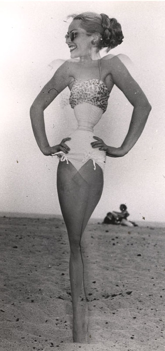 Blonde on beach, with sunglasses