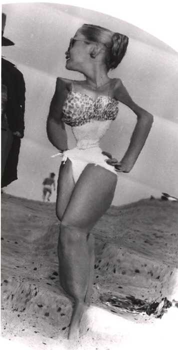 Blonde on beach, with sunglasses