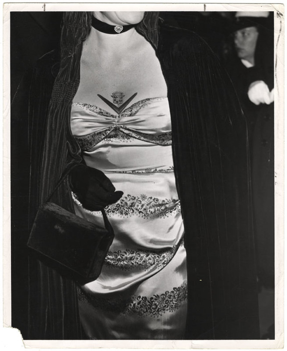 [Movie star with Cadillac cleavage]