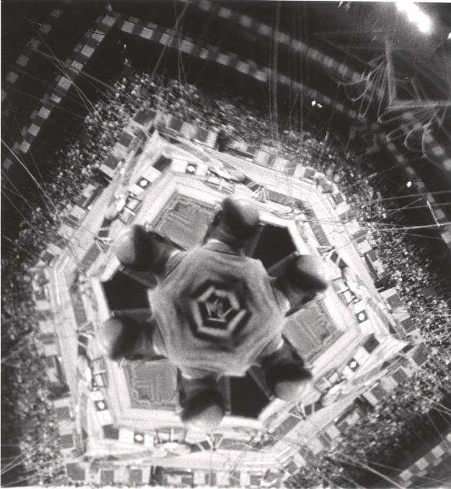 (Circus stage and crowd)