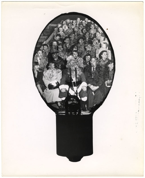 [Santa Claus and audience in a flashbulb]