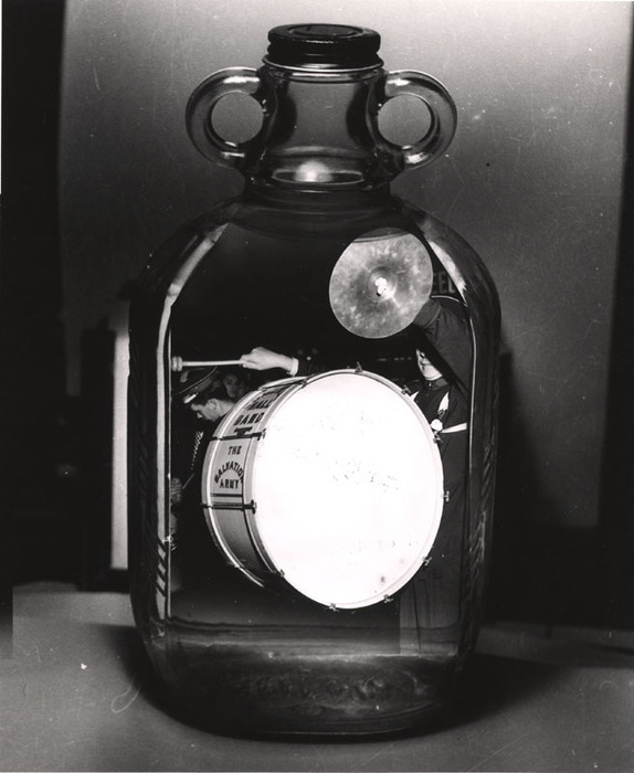 (Salvation Army marching band bass drum and cymbol in a bottle)