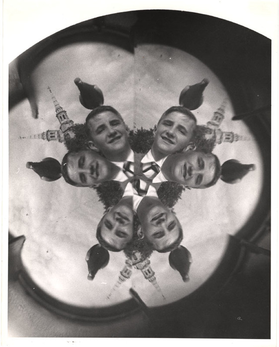 Man with a pigeon on his head