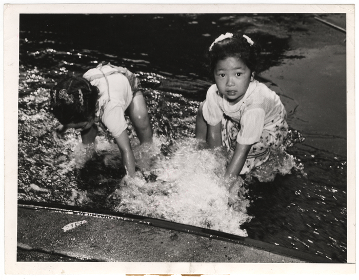 [Girls playing in water]