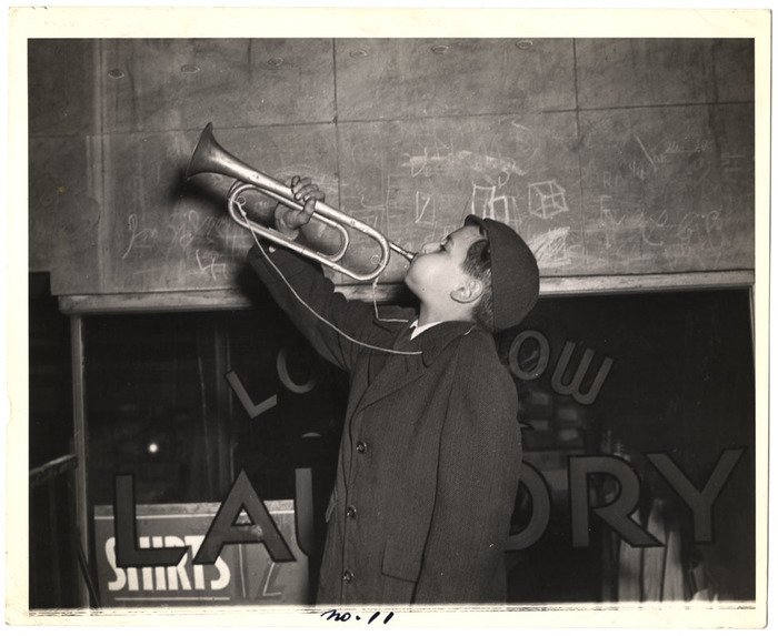 [Bugle playing boy] International Center of Photography