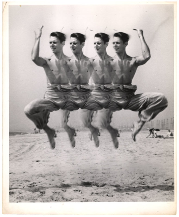 [Distortion of man jumping on beach]