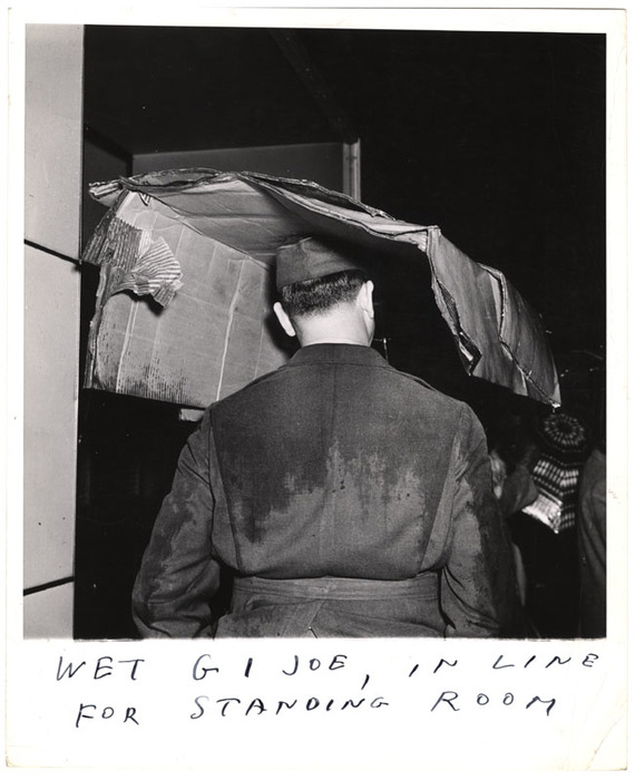 Wet GI Joe,  in Line for Standing Room