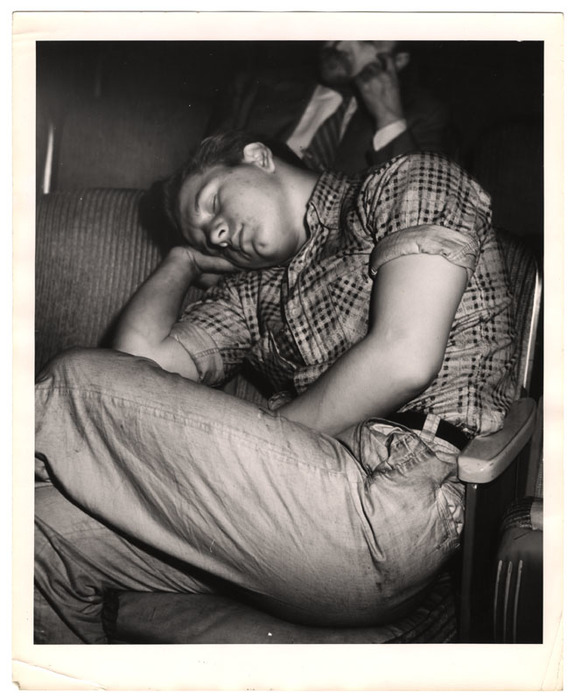 Man sleeping in a movie theatre