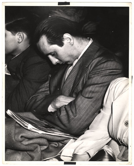 Man sleeping in a movie theater