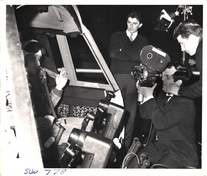 [Stanley Kubrick directing his film "Dr. Strangelove or: How I Learned to Stop Worrying and Love the Bomb"]