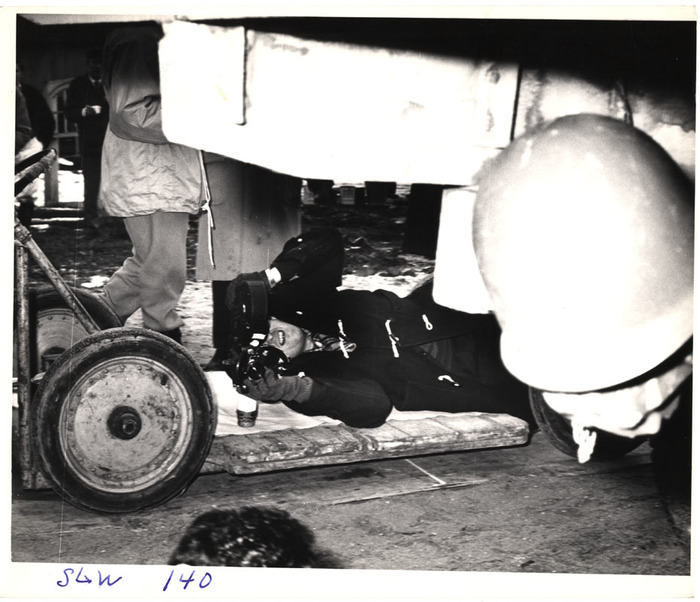 [Stanley Kubrick directing his film "Dr. Strangelove or: How I Learned to Stop Worrying and Love the Bomb"]