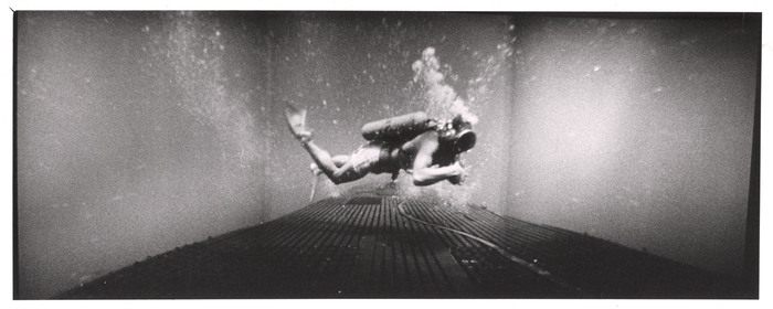 Widescreen image of a scuba diver