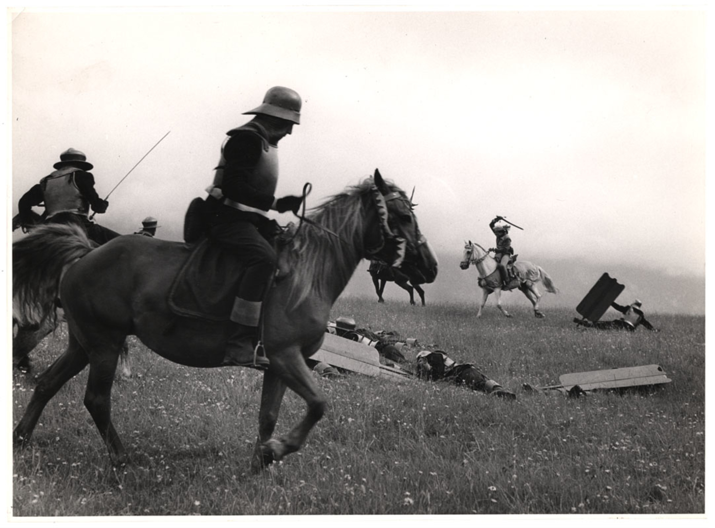 Men on horses in a medieval battle scene International Center of