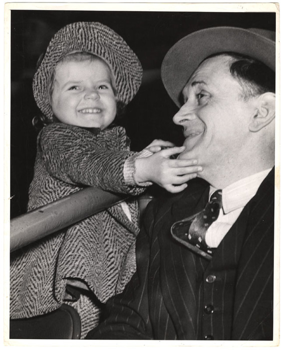 [Girl and man at circus]