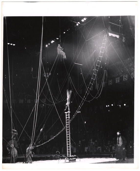 [Acrobats and Emmett Kelly performing in circus]