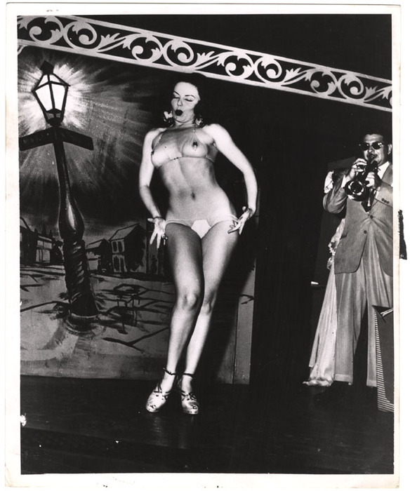 [Stripper and trumpeter]