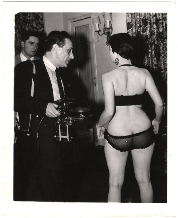 [Showgirl with press photographer]