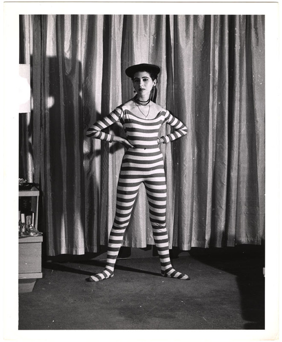 Model wearing striped jumpsuit