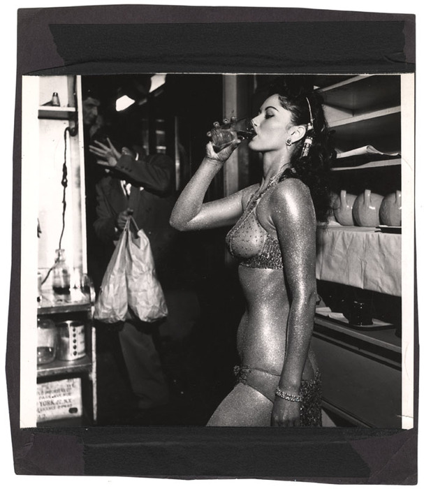 [Gold-painted stripper]