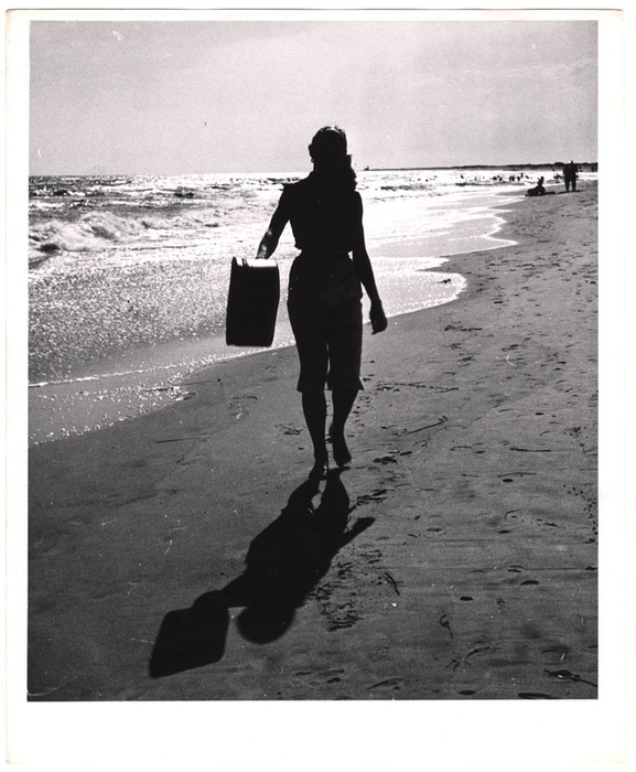Model walking on the beach