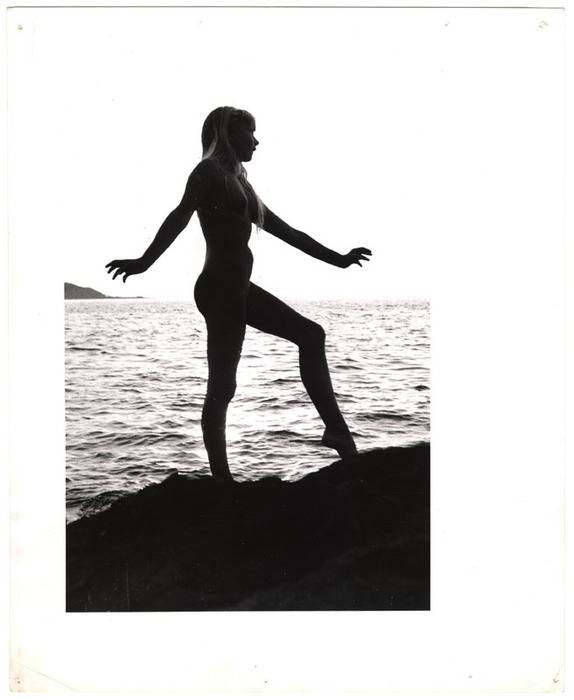 Model on rocks