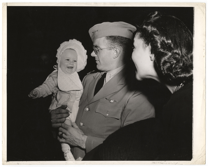 Soldier holding baby essay picture