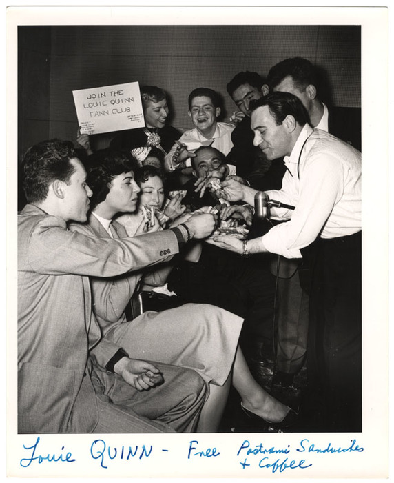 Louie Quinn fann club enjoying free pastrami sandwhiches