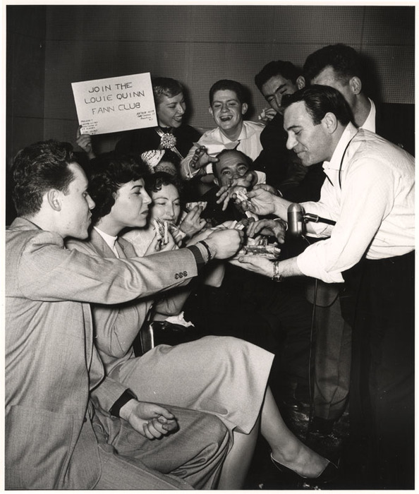 Louie Quinn fann club enjoying free pastrami sandwhiches