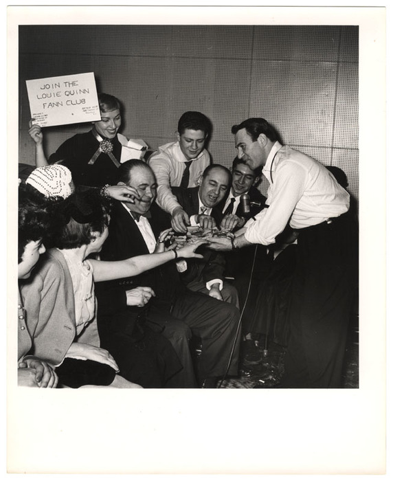 Louie Quinn fann club enjoying free pastrami sandwhiches