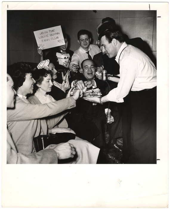 Louie Quinn fann club enjoying free pastrami sandwhiches