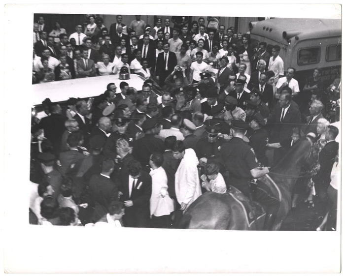 [Robert F. Kennedy with crowds outside 71st Armory, New York]